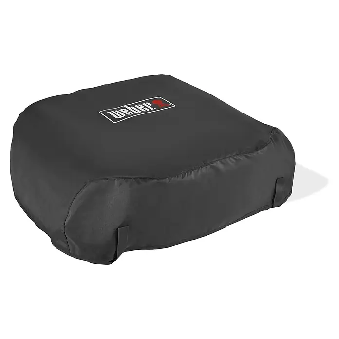 Weber Grill-Schutzhülle - Passend für: Weber Plancha Grill Slate 43, Kunststoff - Das Bild zeigt eine schwarze Weber Grillabdeckung, die das Gerät vor Witterungseinflüssen schützt und die Lebensdauer des Grills verlängert.