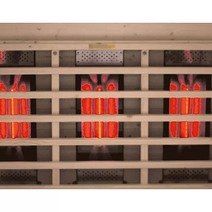 Eilo Infrarotkabine EL-AK 9531 - 2.200 W, 198 x 132 x 102 cm - Infrarot-Heizelemente leuchten rot und orange in einer Sauna aus Holz.