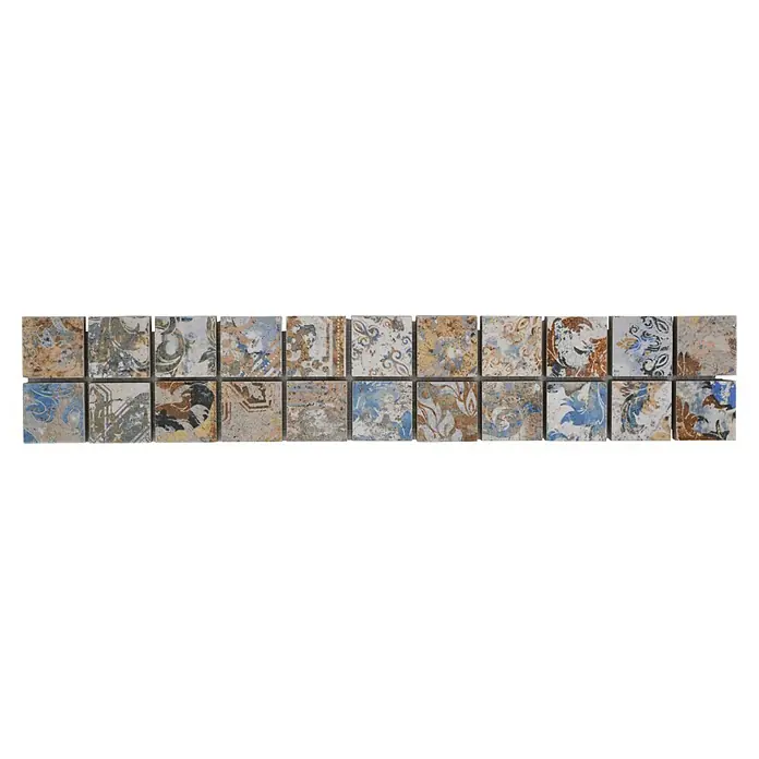Fliesenbordüre Vestige YBO CV25MSC - 29,5 x 5,2 cm, Bunt, Matt - Nahaufnahme von Fliesen mit verschiedenen Mustern in Blau-, Braun- und Grautönen. Dekoratives Design für Innenräume.