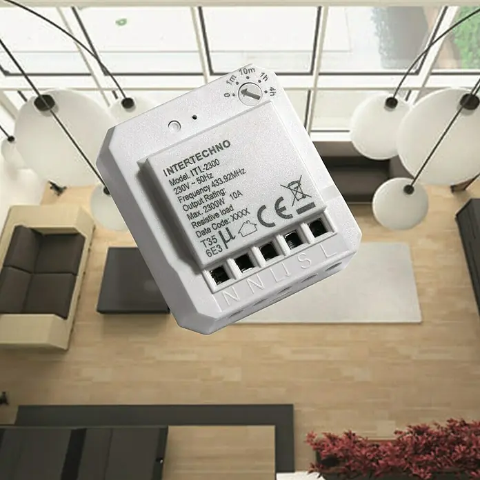 Intertechno Funk-Einbauschalter ITL-2300 - 2.300 W - Nahaufnahme eines Intertechno ITL-2300 Funk-Schaltmoduls mit Timer-Funktion, ideal für die Hausautomation und Steuerung von elektronischen Geräten.