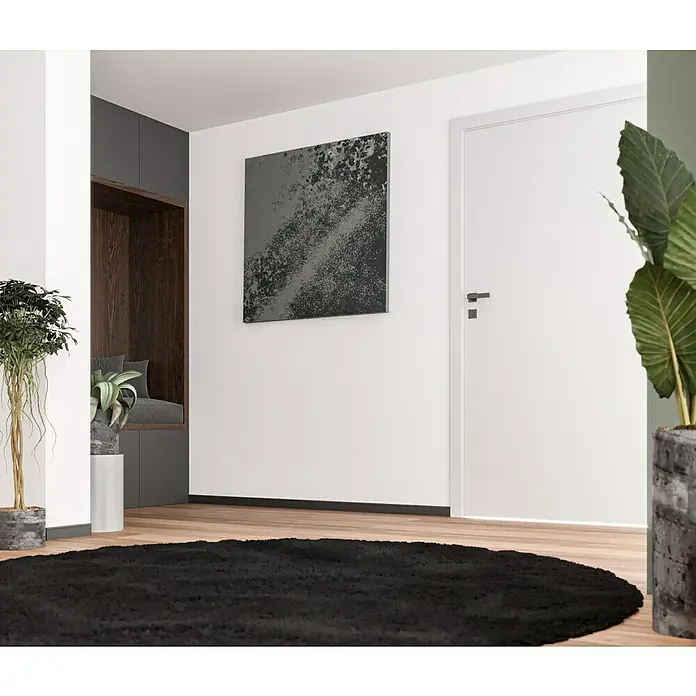 swingcolor effects Flüssige Raufaser Wohnraumfarbe mit Raufaser-Effekt - Weiß, 10 l, Matt - Einladender Flur mit rundem, schwarzem Teppich, Kunstwerk und Pflanzen für eine stilvolle Atmosphäre.