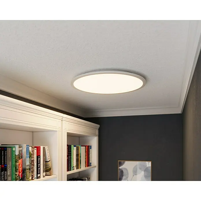 Tween Light LED-Panel rund RC-CCT-DIM - 35 W, Ø x H: 60 x 5 cm, Weiß, Mehrfarbig - Eine moderne, runde LED-Deckenleuchte in einem hellen Raum, die eine sanfte und gleichmäßige Beleuchtung bietet.