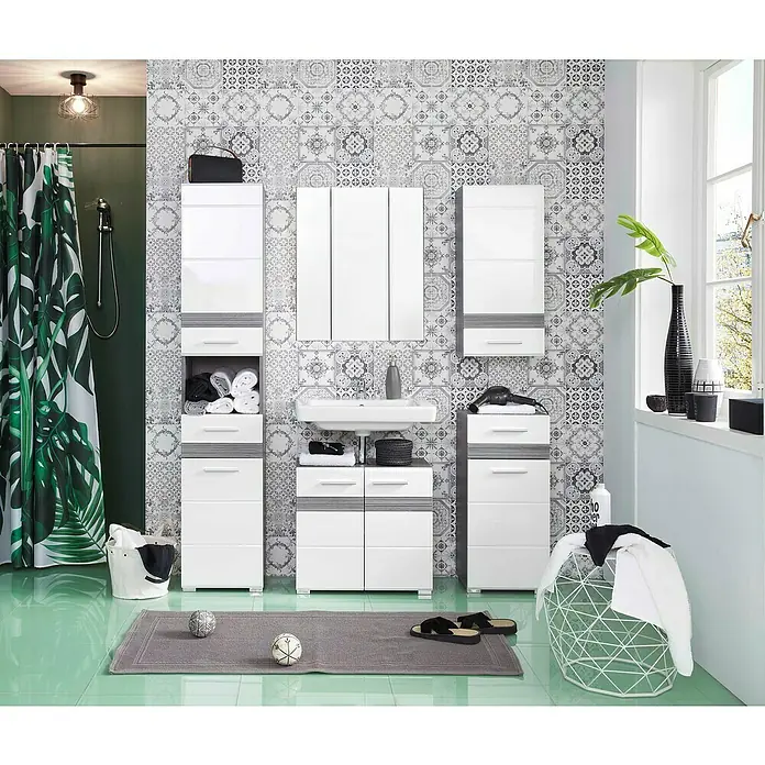 Trendteam Set-One Unterschrank - 37 x 31 x 80 cm, Sardegna Silber/Weiß - Modernes Badezimmer-Interieur mit weißen Badmöbeln, darunter ein Waschtisch, Hochschränke und ein Spiegel, ergänzt durch eine Grünpflanze.