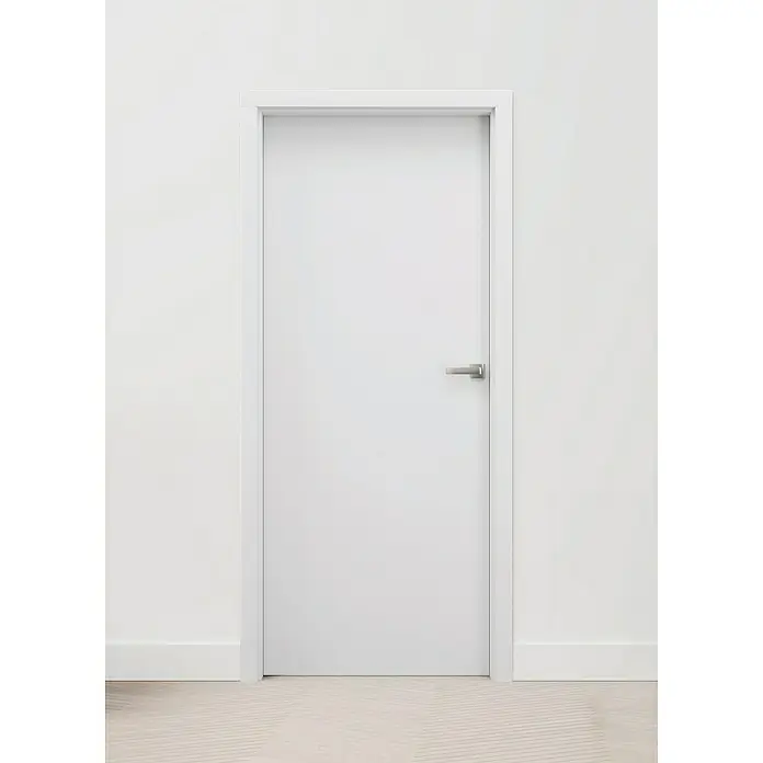 Invado Zimmertür ND1 ohne Schlüssellochbohrung - 985 x 1.985 mm, DIN Anschlag: Rechts, Verkehrsweiß matt, Röhrenspan - Eine moderne weiße Tür mit einem schlanken silbernen Türgriff, eingebettet in eine minimalistische Wand.