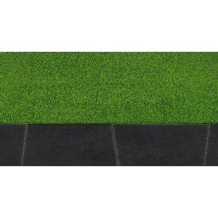 Diephaus Mähstein Flex - 24 x 12 x 4 cm, Anthrazit, Beton - Bild von einem grünen Kunstrasen, der an graue Pflastersteine grenzt, für eine moderne Gartengestaltung.