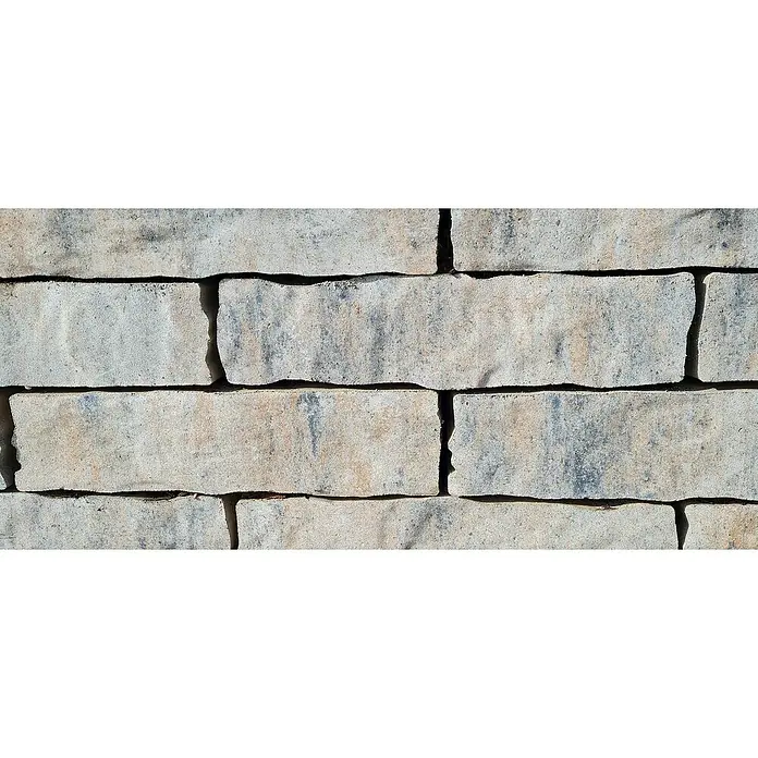 Diephaus Mauerstein Victorville - L x B x H: 40 x 20 x 10 cm, Muschelkalk, Beton - Nahaufnahme einer Steinmauer mit grauen Pflastersteinen, die ein rustikales und langlebiges Design für den Außenbereich zeigen.