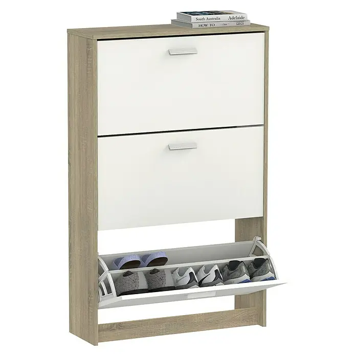 Muebles Pitarch Tibet Zapatero - L x An x Al: 25 x 74 x 119,5 cm, Blanco/Roble Cambrian, Número de compartimentos: 3 ud. - Zapatero con dos compartimentos y una puerta abatible para guardar zapatos. Libros colocados sobre el mueble.