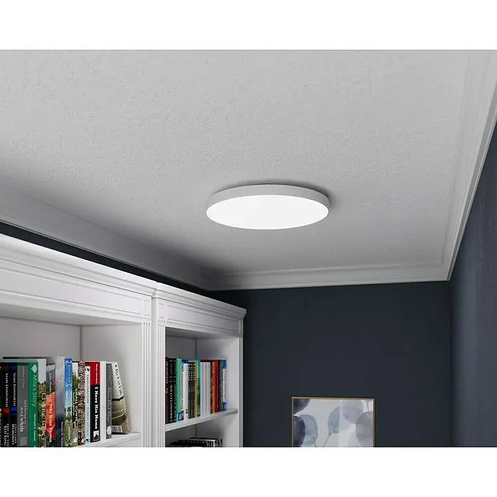 Tween Light LED-Panel rund Frameless - 40 W, Ø x H: 40 x 6 cm, Weiß, Mehrfarbig - Eine runde Deckenleuchte ist an einer weißen Decke montiert und strahlt helles Licht aus.