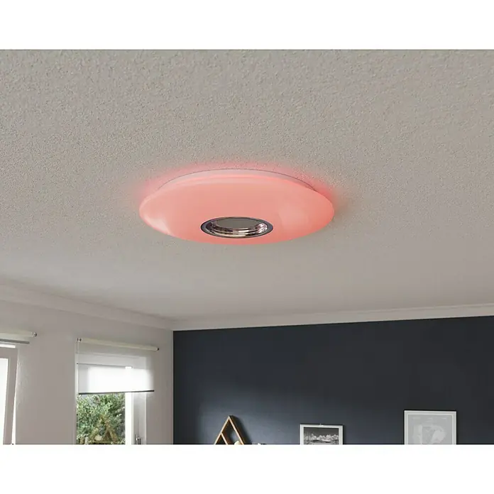 Tween Light LED-Deckenleuchte rund - 24 W, Weiß, RGBW - Deckenleuchte mit roter Beleuchtung an einer weißen Decke.