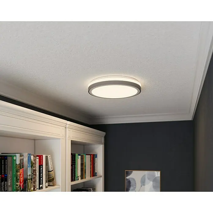 Tween Light LED-Deckenleuchte rund Rimini - 24 W, Ø x H: 40 x 8 cm, Weiß/Grau, Warmweiß - Nahaufnahme einer modernen runden Deckenleuchte mit grauem Rand, die ein helles, gleichmäßiges Licht in einem stilvollen Raum verbreitet.