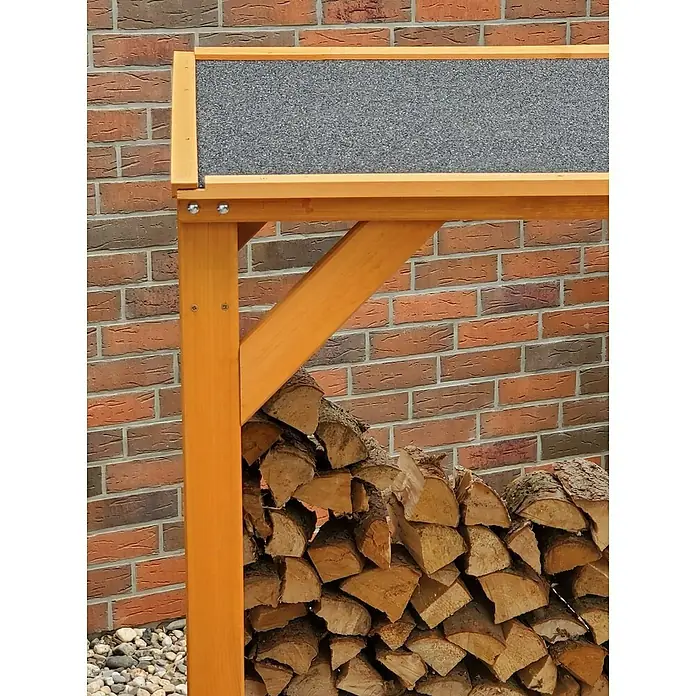 Promadino Kaminholzregal - 120 x 118 x 148 cm, Holz, Braun - Holzlagerregal aus Holz mit grauer Abdeckung. Das Regal ist mit Holzscheiten gefüllt und steht vor einer Backsteinmauer.