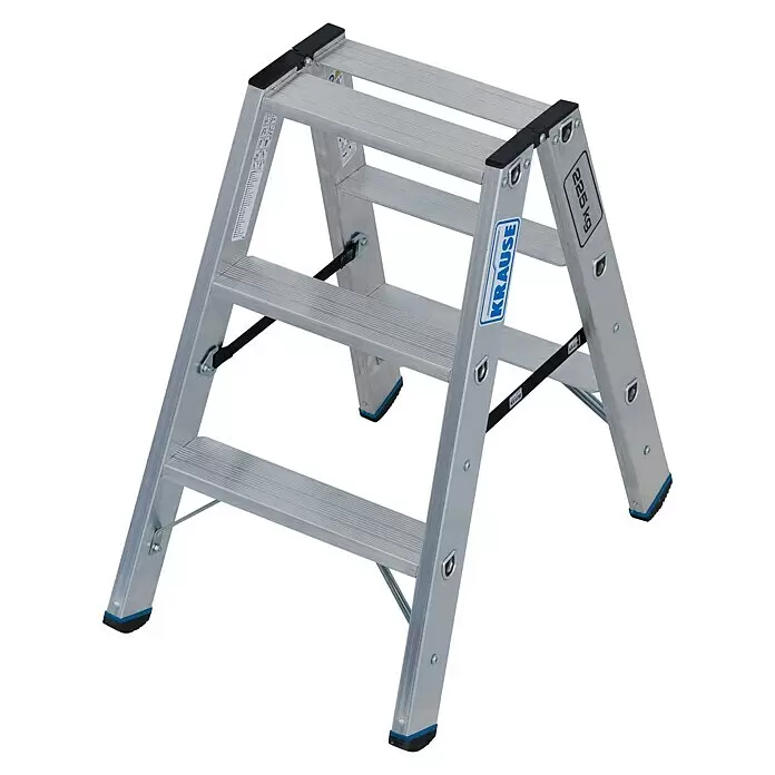 Krause Stabilo Doppel-Stehleiter 2 x 3 Stufen - Anzahl Tritte: 6 Stk., Arbeitshöhe: 2,25 m, Belastbarkeit: 225 kg, Aluminium - Silberne Aluminium-Klappleiter mit schwarzen Anti-Rutsch-Kappen, Füßen und blauen Akzenten. Max. Last 225 kg.