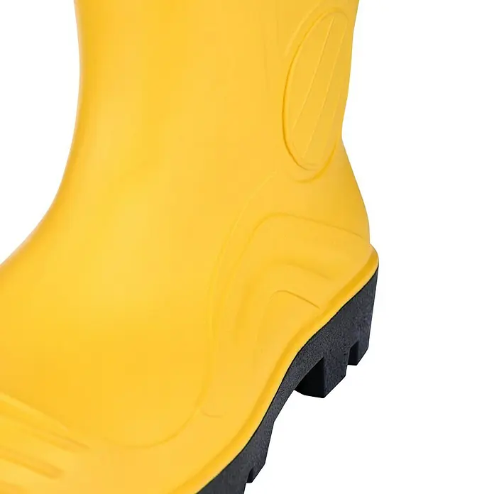 Sicherheitsstiefel - Schuhgröße: 43, S5 - Nahaufnahme eines gelben Gummistiefels mit schwarzer Sohle, ideal für regnerische Tage oder Gartenarbeiten.