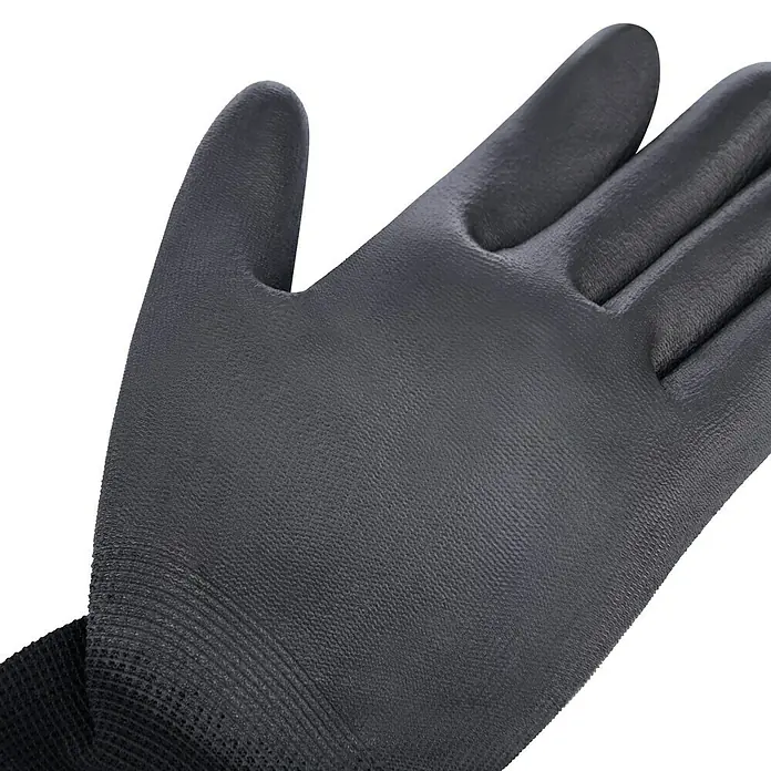 Guide Arbeitshandschuhe 525 - Schwarz, 11 - Nahaufnahme eines schwarzen Handschuhs, ideal für Arbeiten, die Schutz und Präzision erfordern. Hervorragende Passform und hohe Strapazierfähigkeit.