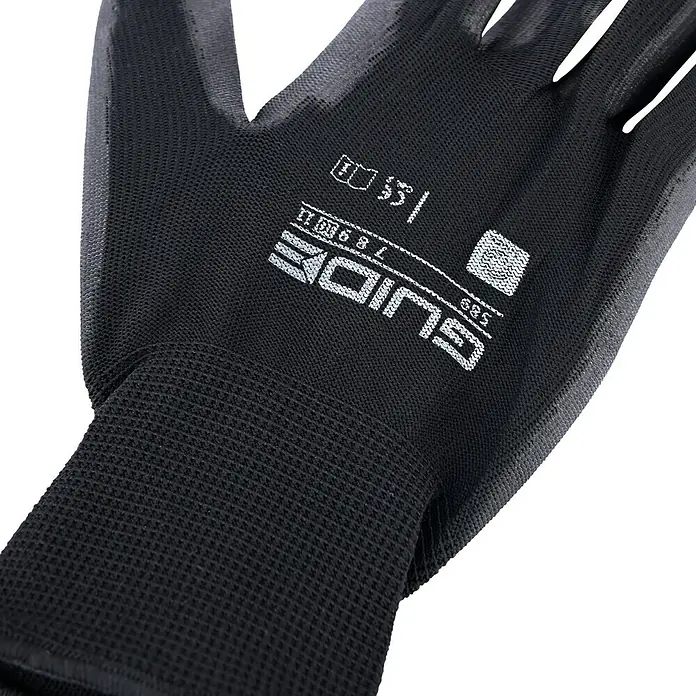 Guide Arbeitshandschuhe 589 PP - Schwarz, 10 - Nahaufnahme eines schwarzen Guide 585 Arbeitshandschuhs mit Strickbund und schützender Beschichtung. Ideal für präzise Arbeiten.