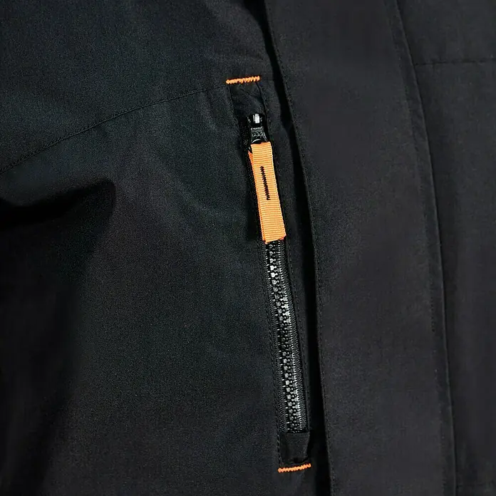 L.Brador Winterjacke 2190P - Schwarz, XXL - Nahaufnahme einer schwarzen Jacke mit einem orangefarbenen Reißverschlussdetail. Funktionell und modisch zugleich.