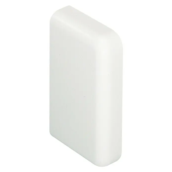 Legrand Tapa final clima 60 x 100 mm - Plástico - Primer plano de un remate de pared blanco con bordes redondeados, ideal para transiciones limpias y diseño de pared elegante.