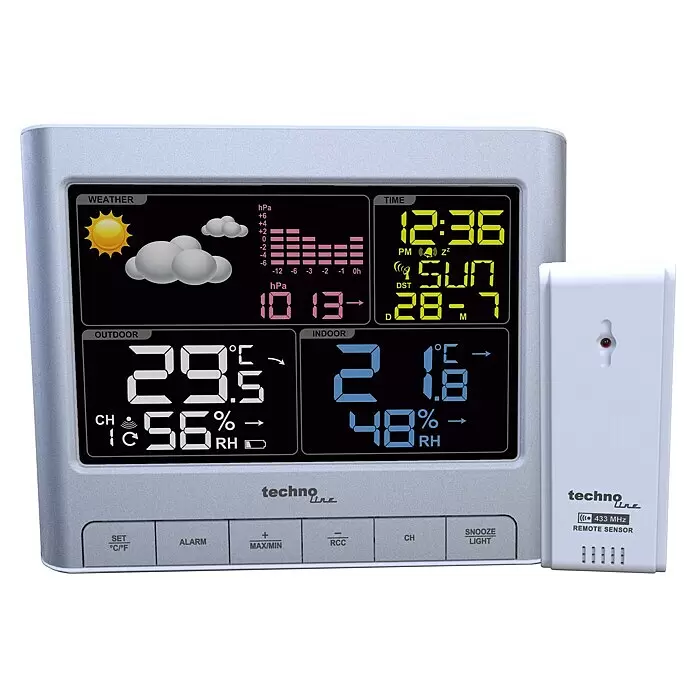 Technoline Funkwetterstation WS6449 - Digitales Display, Netzbetrieben, Silber - Silber-graue digitale Wetterstation mit separatem weißem Fernsensor, zeigt Innen-/Außentemperatur, Luftfeuchtigkeit und Wettervorhersage an.
