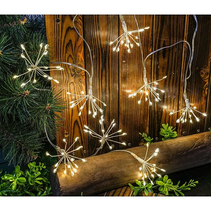 BAUHAUS Guirnalda luminosa solar Fireworks - Largo: 3,4 m, LED - Guirnalda de luces decorativa con lámparas en forma de estrella, perfecta para iluminación festiva y ambiente acogedor.