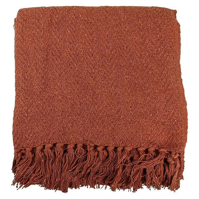 Decke Kent - Pumpkin Orange, 170 x 130 cm, 100 % Baumwolle - Braune Tagesdecke mit Fransen, die eine warme und einladende Atmosphäre schafft. Die Textur des Stoffes ist detailliert und ansprechend.