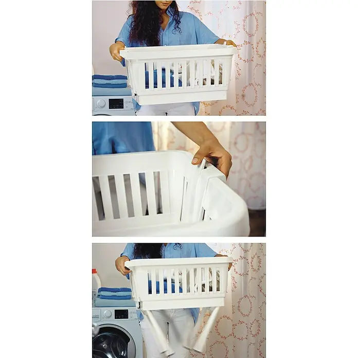 Wäschekorb Amico - L x B x H: 43 x 64 x 61 cm, Anthrazit, Klappbare Beine - Frau präsentiert einen weißen Wäschekorb mit ausklappbarem Gestell, ideal für Wäscheorganisation im Badezimmer.