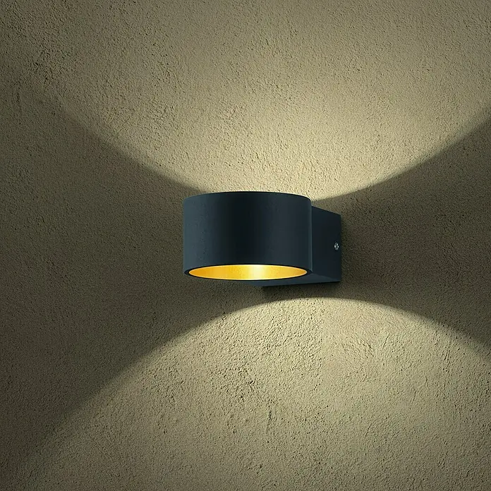 Trio Leuchten LED-Wandleuchte Lacapo - 4,5 W, L x B x H: 15 x 10,5 x 6 cm, Schwarz, Schwarz, Gold, Warmweiß - Moderne Wandleuchte mit zylindrischem Design und goldener Innenseite, die warmes Licht an die Wand wirft.\n