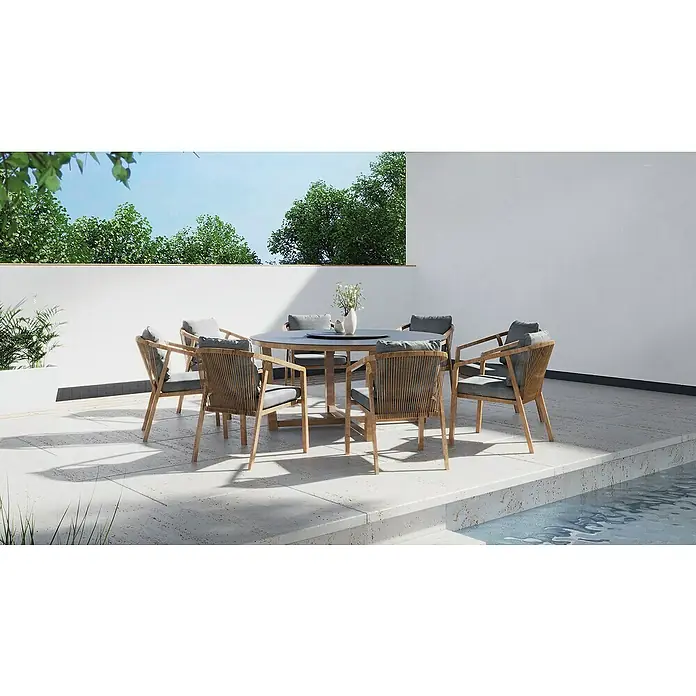 MWH Gartenmöbel-Set - 7 -tlg., Aluminium/Fairstone, Night-Grey/Braun - Gartensitzgruppe mit einem runden Tisch und sechs Korbstühlen mit grauen Polstern auf einer Terrasse neben einem Pool.