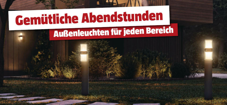 Gewächshaus bei Nacht im Garten mit schwarzem Rahmen und Glas, wie ein Wohnzimmer gemütlich eingerichtet und mit Leuchten bestückt, Titel Gemütliche Abendstunden