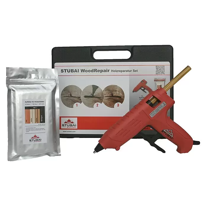 Stubai Reparatur-Set - Geeignet für: Holz - Eine rote STUBAI Holzreparatur-Klebepistole und ein silberner Beutel mit verschiedenen Holzfüllerstäbchen, Teil eines Holzreparatur-Sets.