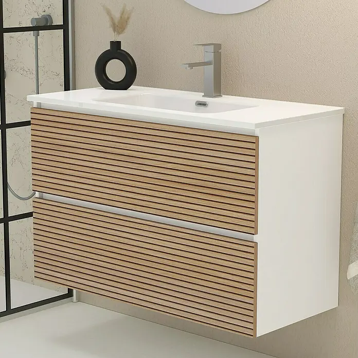 Artysan Mueble bajo de lavabo Osaka - L x An x Al: 46 x 100 x 64 cm, Blanco/Nogal - Imagen de un tocador de baño moderno con cajones de madera clara y una encimera blanca con lavabo y grifo.