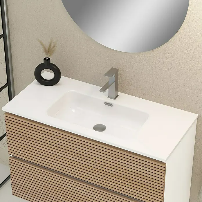 Artysan Mueble bajo de lavabo Osaka - L x An x Al: 46 x 100 x 64 cm, Blanco/Nogal - Primer plano de un moderno mueble de baño con un elegante armario de madera y un espejo redondo.