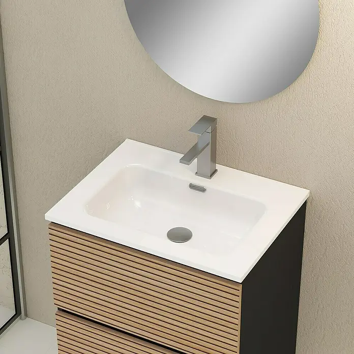 Artysan Mueble bajo de lavabo Osaka - L x An x Al: 46 x 60 x 64 cm, Negro/Nogal - Primer plano de un lavabo moderno con textura de madera y encimera, acentuado por un espejo redondo. Diseño de baño elegante.