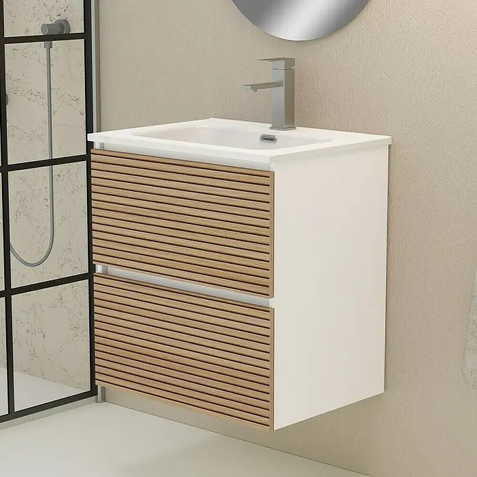 Artysan Mueble bajo de lavabo Osaka - L x An x Al: 46 x 60 x 64 cm, Blanco/Nogal - Un moderno mueble de baño con cajones de madera y cuerpo blanco, complementado con un espejo redondo y grifo.