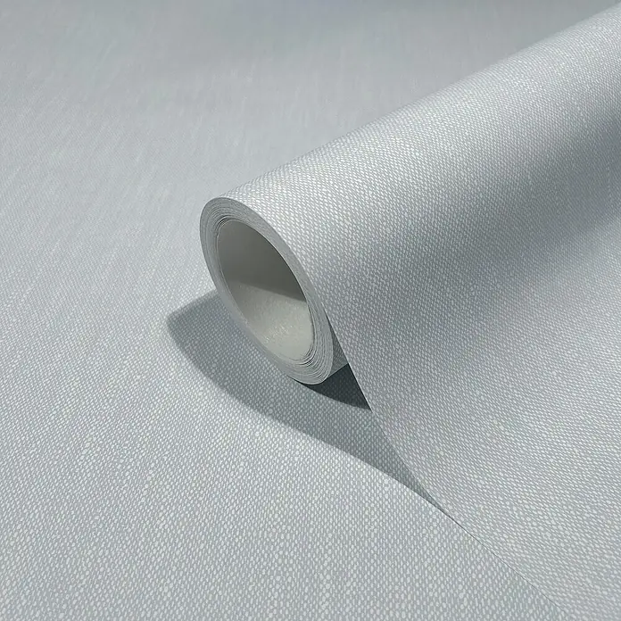 Marburg Heritage Vliestapete Textil-Optik - Blau, Uni, 10,05 x 0,53 m - Nahaufnahme einer Rolle hellgrauer Vinyltapete mit feiner Textur, ideal für die Wandgestaltung im Innenbereich.