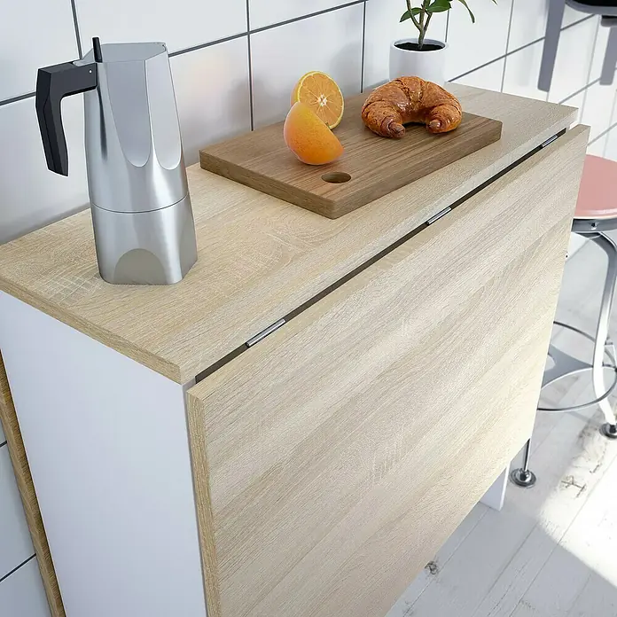Mesa auxiliar Fly - L x An x Al: 31 x 77 x 78 cm, Blanco Artik/Roble Canadian, Abatible - Una tabla de madera clara con una cafetera, una naranja y un croissant, ideal para un desayuno acogedor.