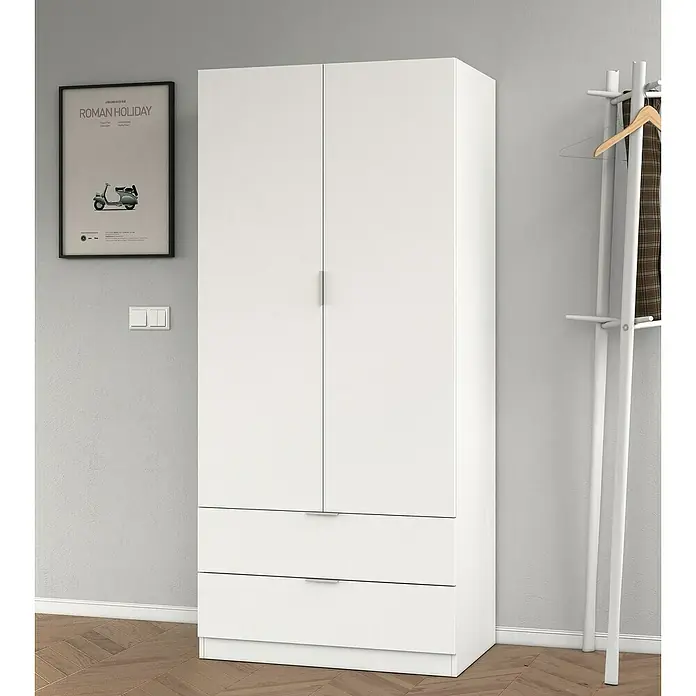 Armario para ropa LCX222 - L x An x Al: 52 x 81 x 180 cm, Blanco - Un armario grande y blanco con dos puertas y dos cajones está situado en una habitación con parqué.