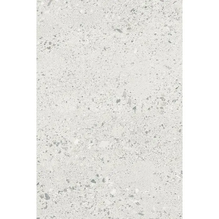 Encimera de cocina al corte Light Terrazo Marble - Light Terrazo Marble, Espesor: 38 mm, Ancho: 63,5 cm - Primer plano de un suelo de terrazo gris que muestra una superficie lisa y uniforme con pequeñas inclusiones oscuras.