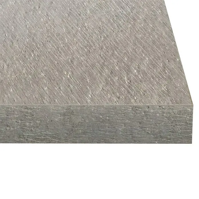 Encimera de cocina al corte Dove Venera - Dove Venera, Espesor: 38 mm, Ancho: 63,5 cm - Primer plano de una losa de hormigón gris con superficie irregular y textura y un borde liso y recto.