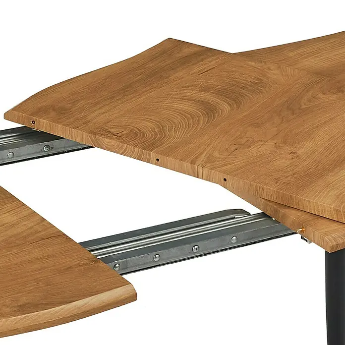 Home Deco Factory Mesa de comedor extensible Bristot Indus - L x An x Al: 70 x 160 x 75 cm, Negro - Vista detallada de una mesa de comedor extensible con tapa de madera marrón clara y guías de extensión metálicas. La mesa combina funcionalidad y estética.