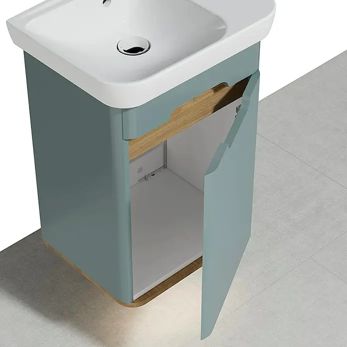 VitrA Sento Badmöbel-Set - Gesamtbreite Badmöbel: 50 cm, Fjordgrün, Matt, DIN Anschlag: Rechts - Ein Waschbeckenunterschrank in stilvollem Blau mit einer offenen Tür, die Einblick in den Stauraum bietet. Holzdetails an Ober- und Unterseite.