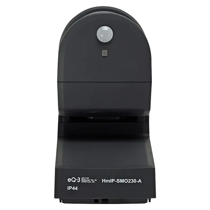 Homematic IP Bewegungsmelder mit Schaltaktor - Anthrazit, 1.150 W - Das Bild zeigt einen schwarzen Homematic IP Bewegungsmelder für den Außenbereich. Das Gerät trägt die Bezeichnung HmIP-SMO230-A.