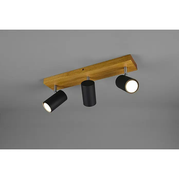 Trio Leuchten Marley Deckenstrahler - 105 W, L x B x H: 9 x 44 x 16 cm, Schwarz, GU10, 3 Stk. - Diese Aufnahme zeigt eine stilvolle Deckenleuchte mit drei schwarzen Strahlern, die an einer hölzernen Basis befestigt sind und ein warmes Licht ausstrahlen.