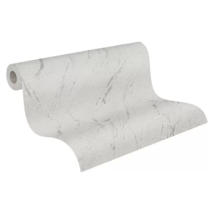 A.S. Création Casual Living Vliestapete Marmor - Silbergrau-Metallic, Steinoptik, 10,05 x 0,53 m - Teilweise abgerollte Rolle hellgrauer, strukturierter Tapete mit dezentem Muster.