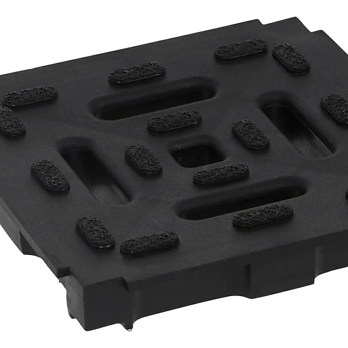 ACO Hexaline Eckstück mit Verlängerung Schlitzaufsatz 2.0 - 12,5 x 12,5 x 13,8 cm - Eine schwarze, robuste Gummimatte mit rechteckigen Aussparungen und erhöhten Noppen für zusätzlichen Halt und Sicherheit.