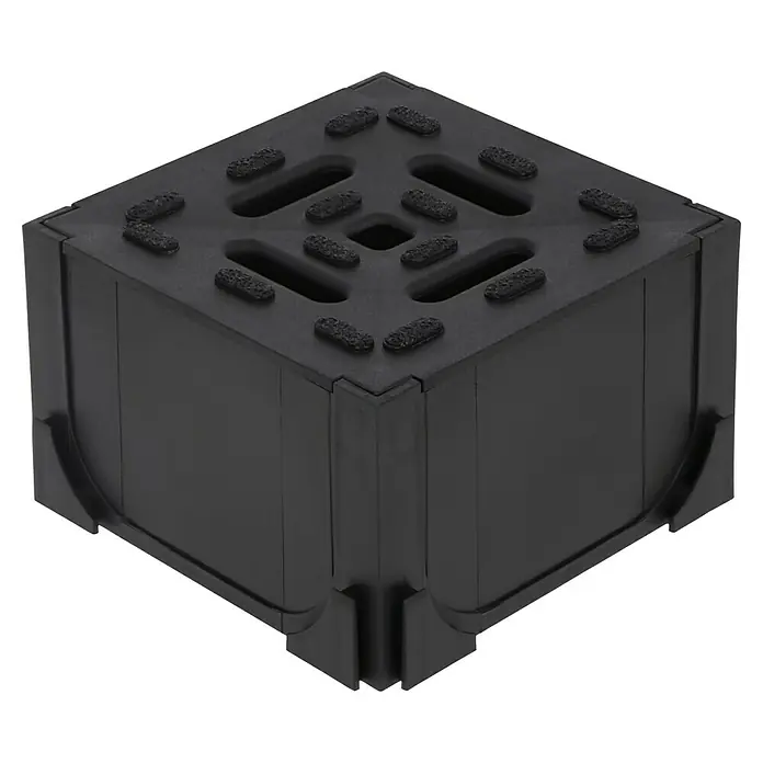 ACO Hexaline Universal-Eckstück - 12,5 x 12,5 x 7,8 cm - Hier ist ein Detailbild eines schwarzen Würfels mit Gummieinsätzen und Aussparungen auf der Oberseite, der wie ein Möbelbein aussieht.