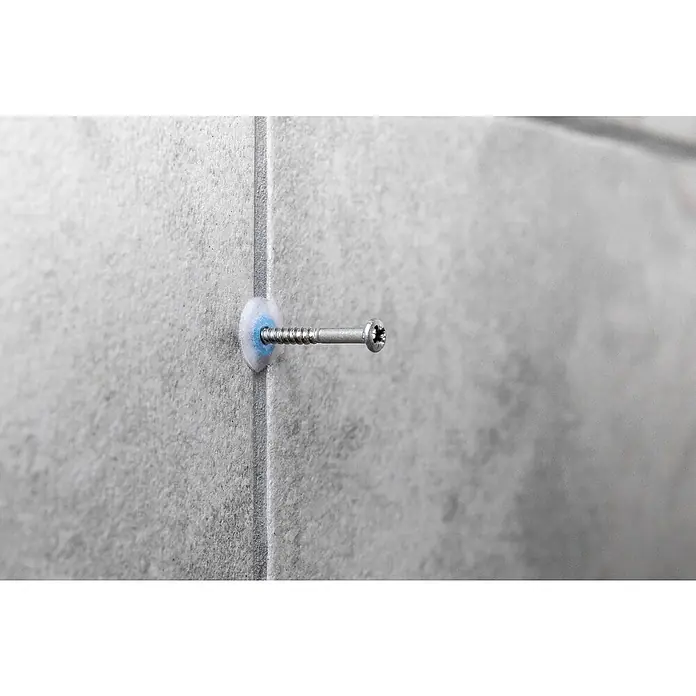 Bohrloch-Set - Passend für: Brausestangen, Seifenkörbe, Armaturen, Duschablagen - Nahaufnahme einer Schraube mit Unterlegscheibe in einer gefliesten Wand. Ideal für Heimwerker- und Bauprojekte, die einen sicheren Halt erfordern.