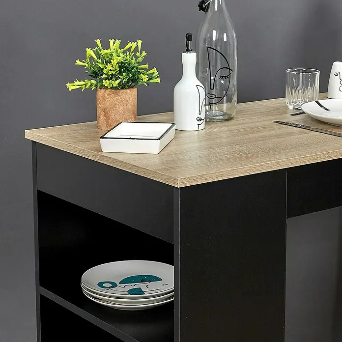 Home Deco Factory Mesa alta Bristot Indus - L x An x Al: 50 x 115 x 103 cm, Negro/Roble - Primer plano de una mesa elegante con una mesa de color marrón claro y un marco negro, adornada con objetos decorativos y vajilla.