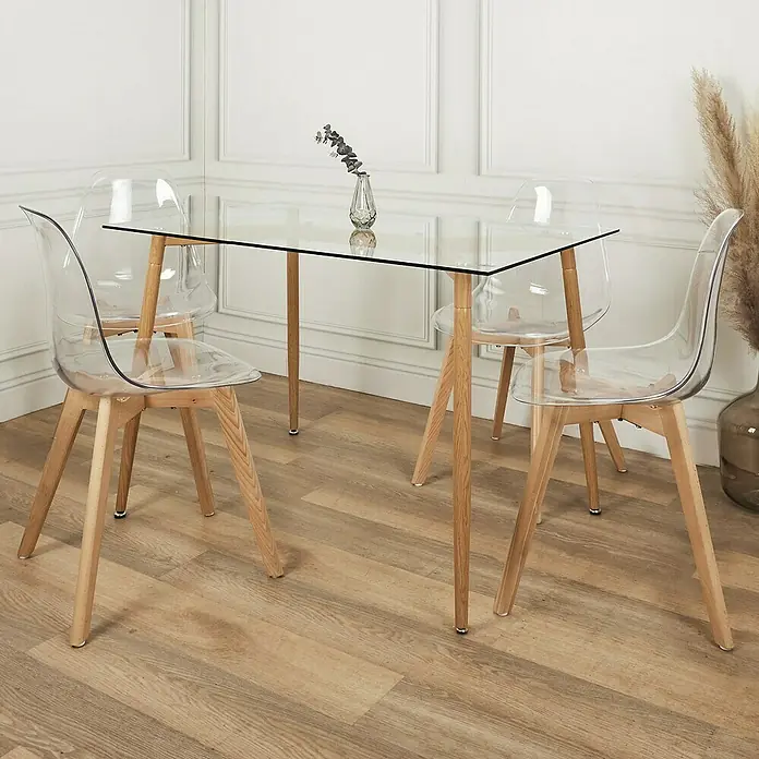 Mesa de comedor Cristal - L x An x Al: 75 x 115 x 75 cm, Transparente - Una elegante mesa de comedor con tablero de vidrio combinada con sillas transparentes con patas de madera, ideal para comedores modernos.