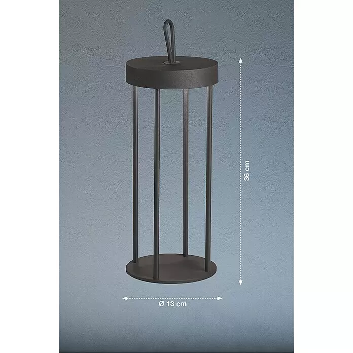 FHL easy Akku-Tischleuchte KANTE - 3 W, L x B x H: 13 x 13 x 36 cm, Schwarz, Warmweiß - Runder, dunkelgrauer Metall-Kaminholzständer mit vertikalen Stangen und Griff zum praktischen Aufbewahren von Holz.