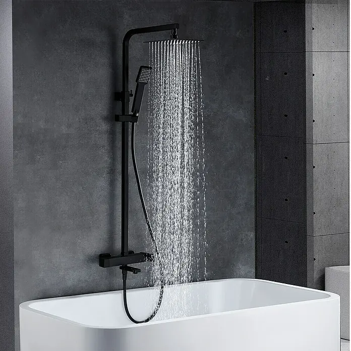 Imex Fiyi Sistema de ducha y bañera - Grifo monomando, Negro - Conjunto de ducha negro con rociador de lluvia y ducha de mano sobre una bañera blanca. Diseño elegante para un baño moderno.